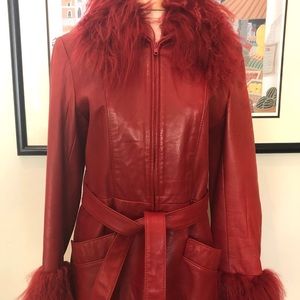 Mongolian collar and sleeve fur on leather.